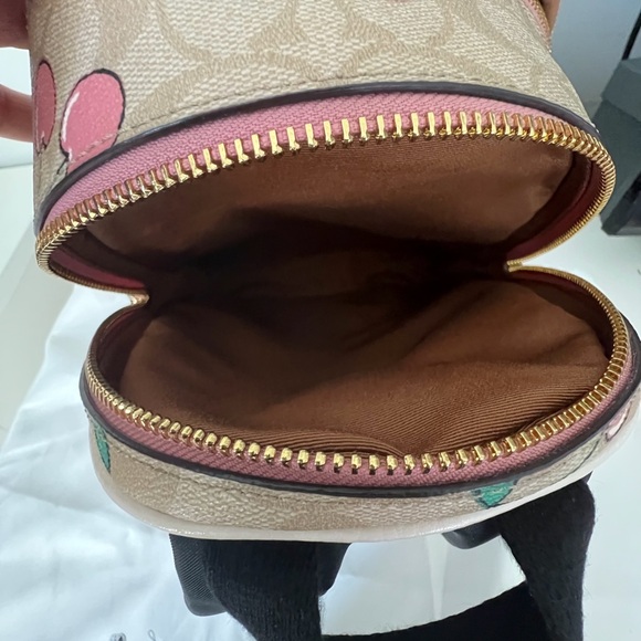 coach heart backpack Munster  Johnnie Brocks Printed coated canvas and refined pebble leather Inside zip and multifunction pockets Double zip closure fabric lining Handle with 2 1/4 drop Outside zip pocket Adjustable shoulder straps 10 3/4 (L) x 12 1/2 (H) x 4 3/4 (W) Style No. Coach Court Backpack with Stripe